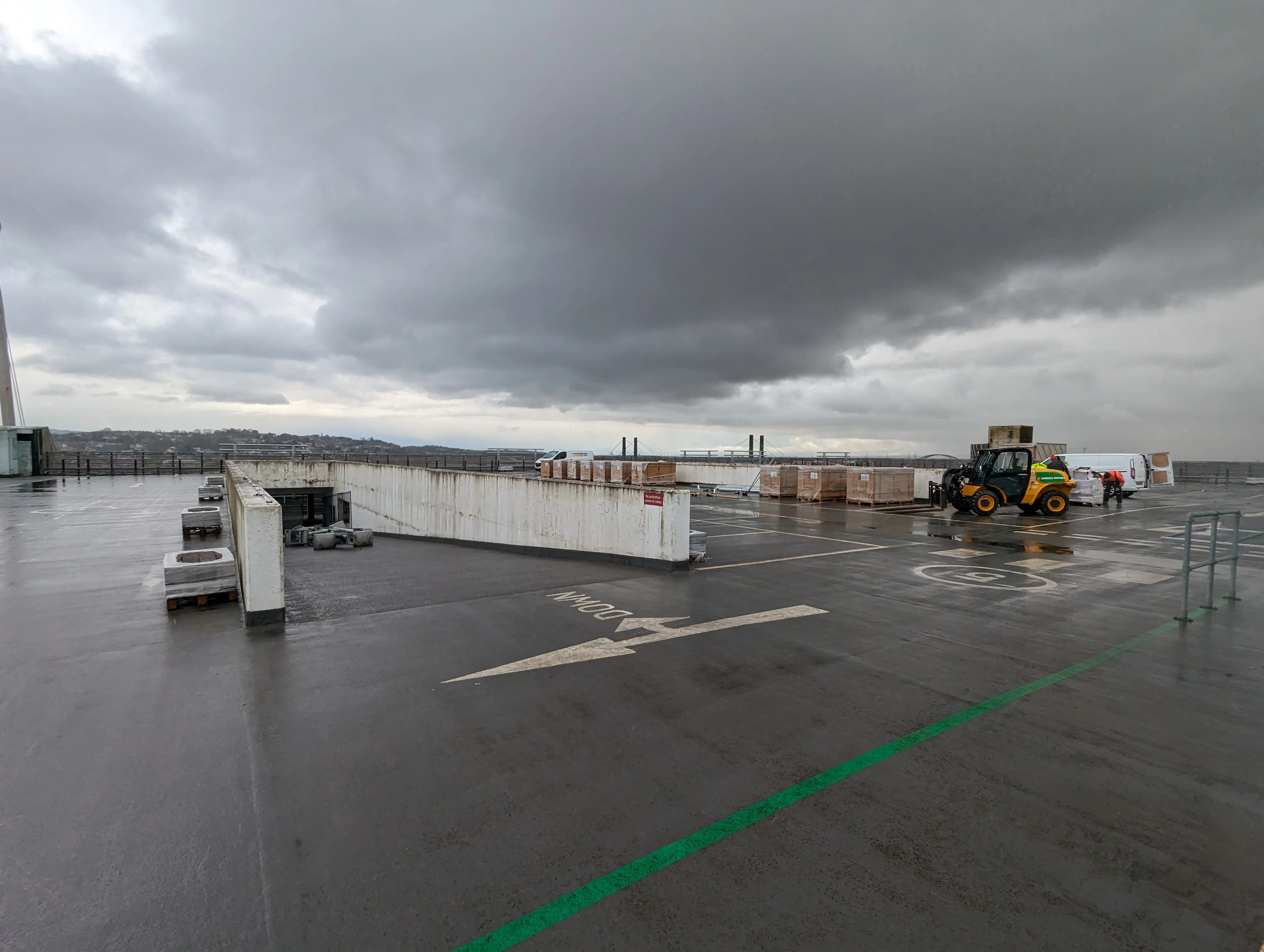Solar panels being moved into position on the Kingsway Centre rooftop ahead of installation.