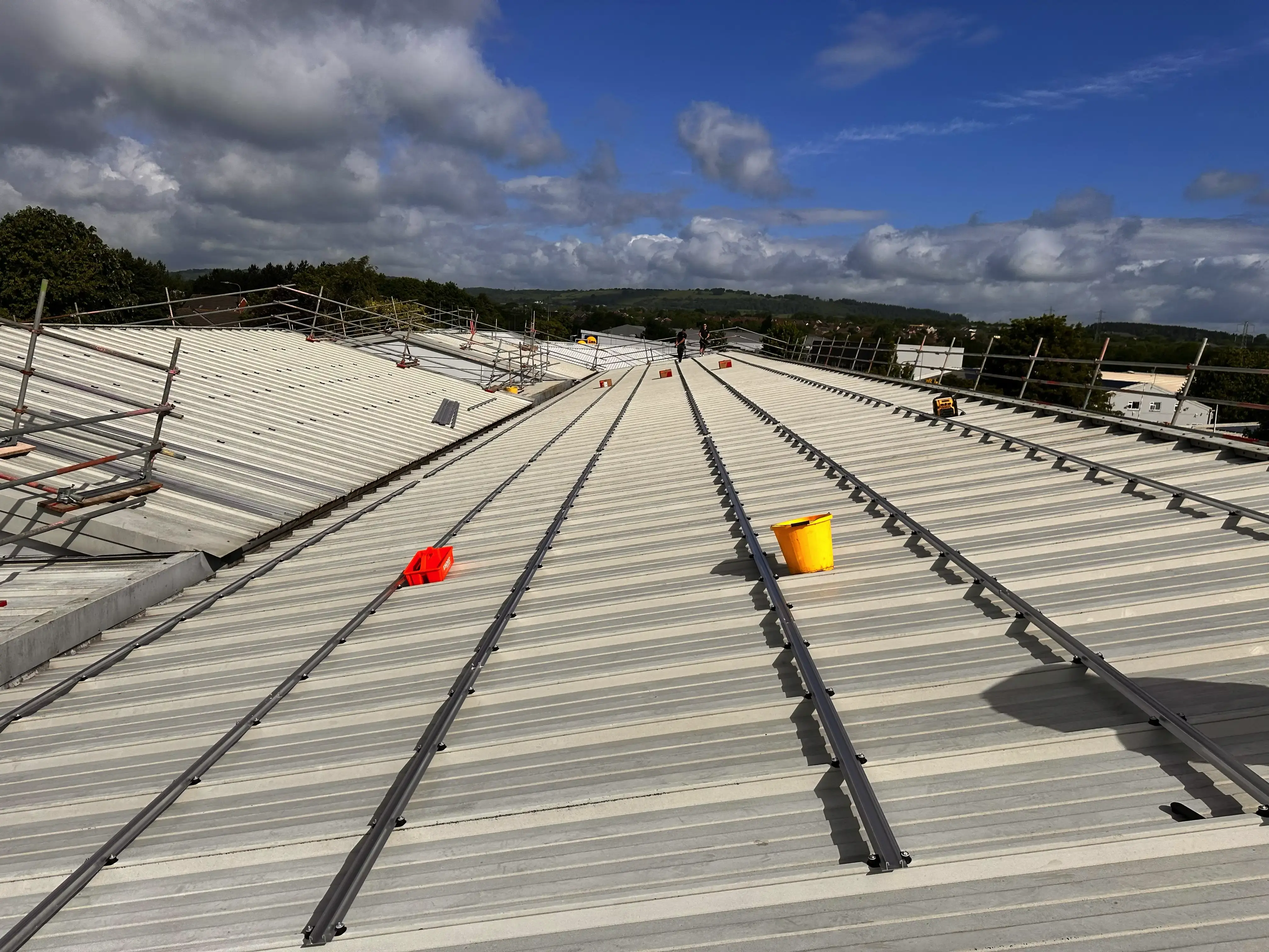 Solar PV rail mounting system on metal roof, Vision Court Cardiff.