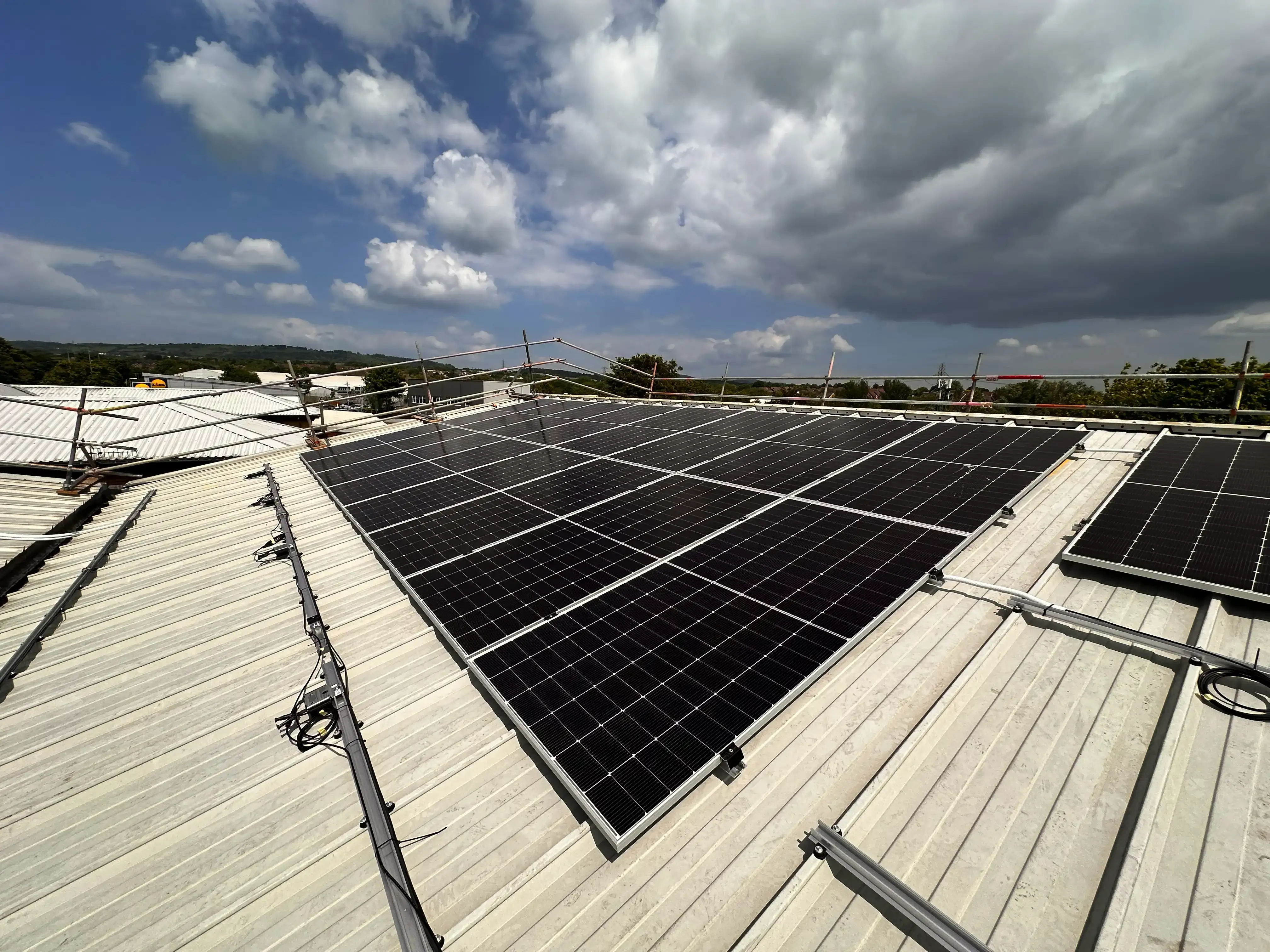 Commercial roof solar PV array, Vision Court Cardiff.
