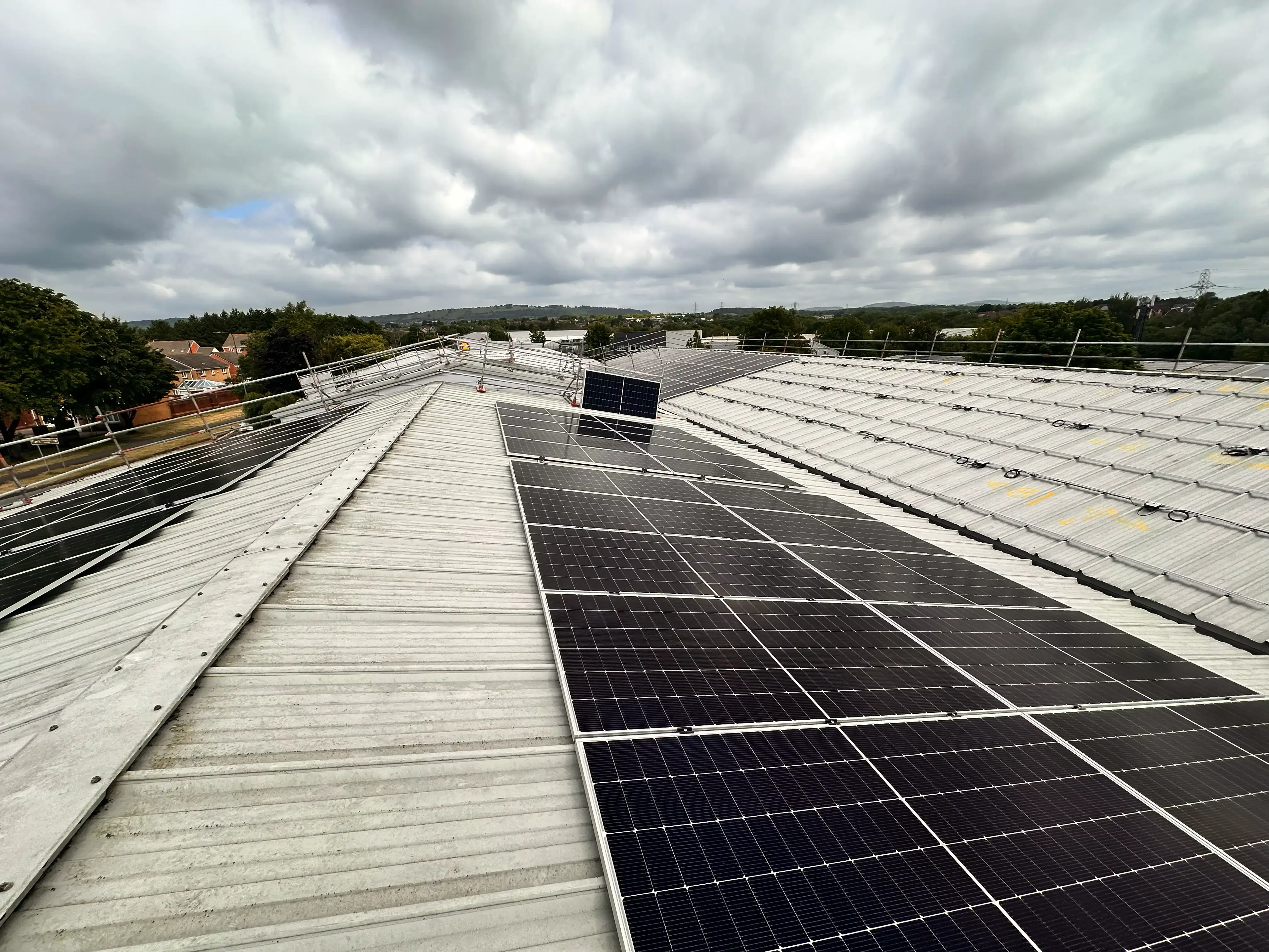Solar panels installed on the metal roof at Vision Court in Cardiff