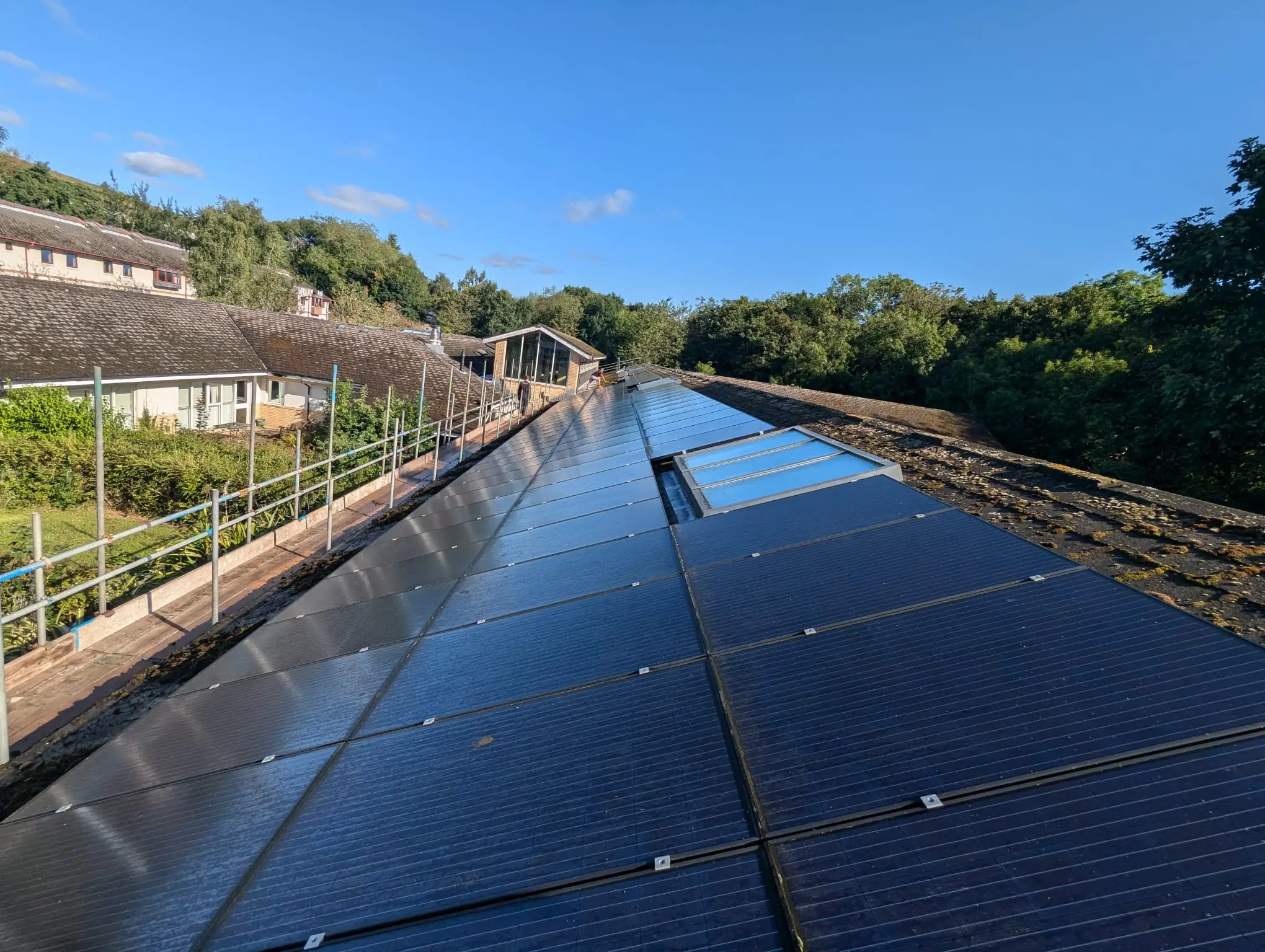 Solar PV installation on a public sector building, demonstrating commercial solar deployment for healthcare and government clients.