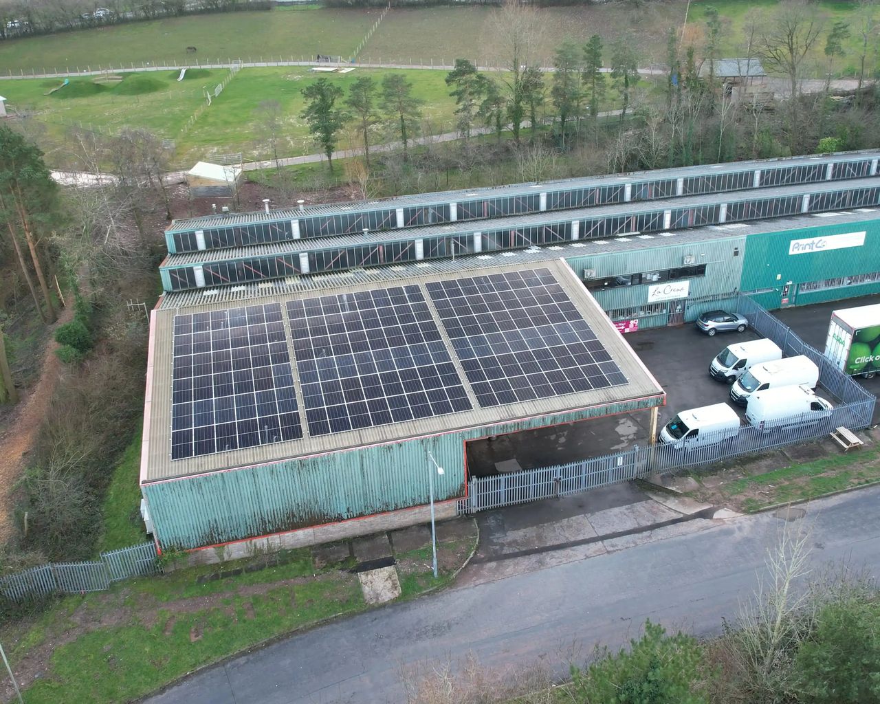 Aerial view of La Cr&egrave;me Patisserie's Cwmbran site with rooftop solar PV array
