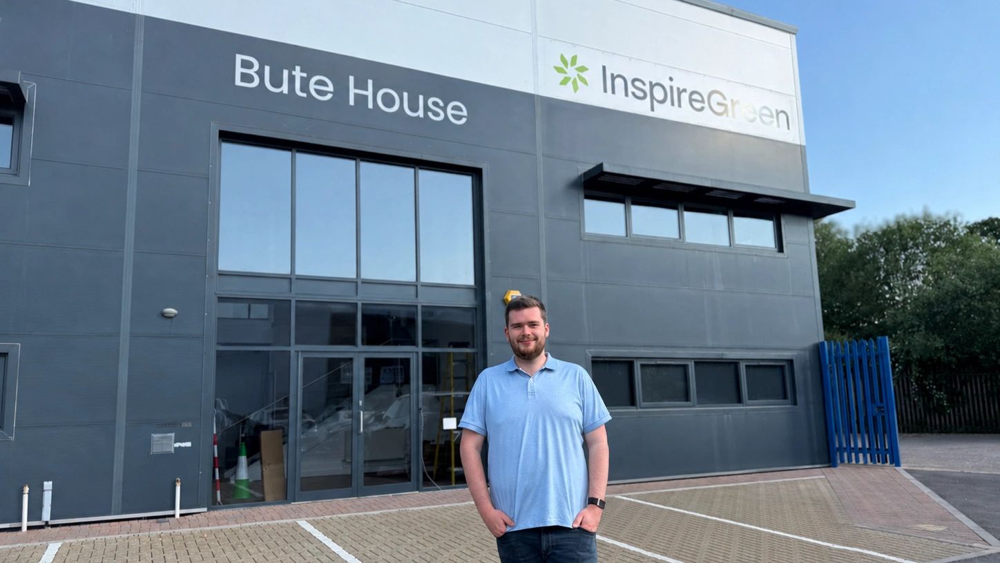 Josh Powell, Founder and CEO of InspireGreen, standing outside the company's new headquarters at Bute House, Lamby Way, Cardiff.
