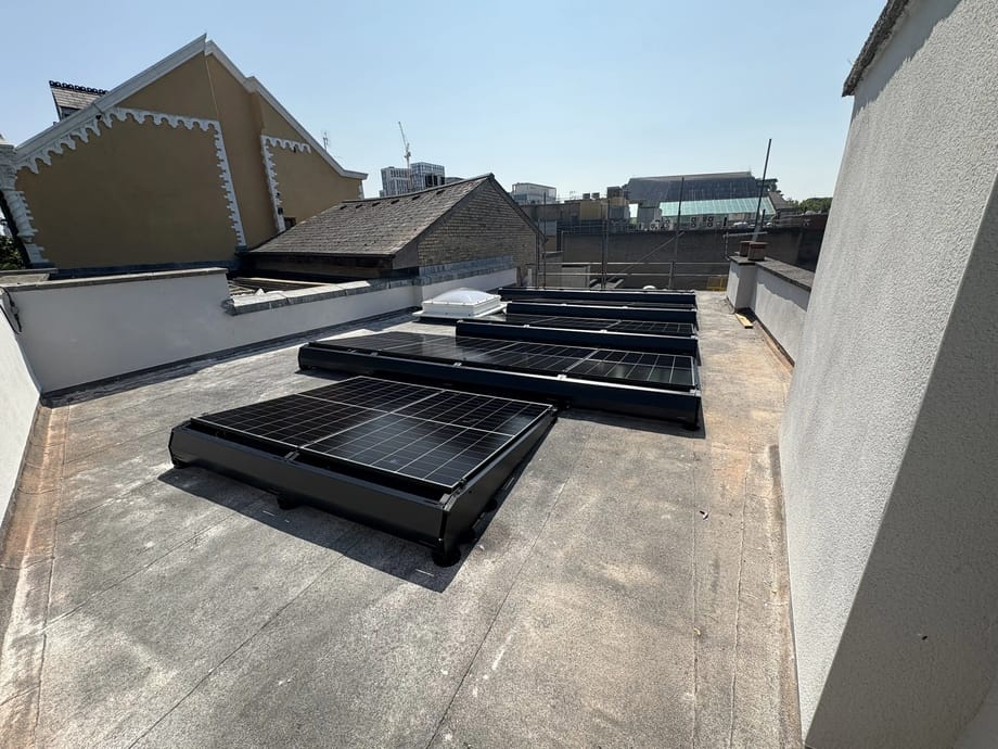 Completed rooftop solar PV array at Trailfinders' Cardiff travel centre on Queen Street